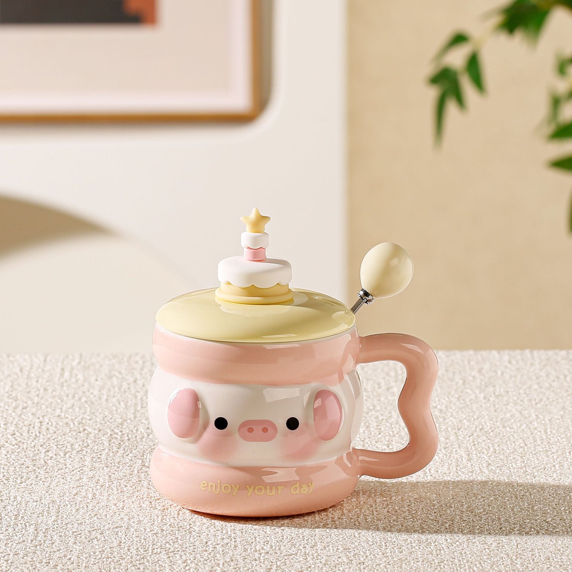 cute animal ceramic mug with lid on cozy desk setup
