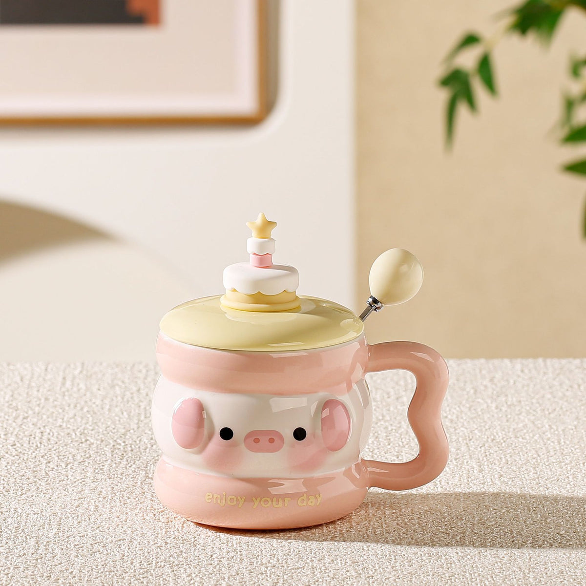 cute animal ceramic mug with lid on cozy desk setup