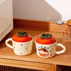cute persimmon cat ceramic mug with lid on cozy coffee table
