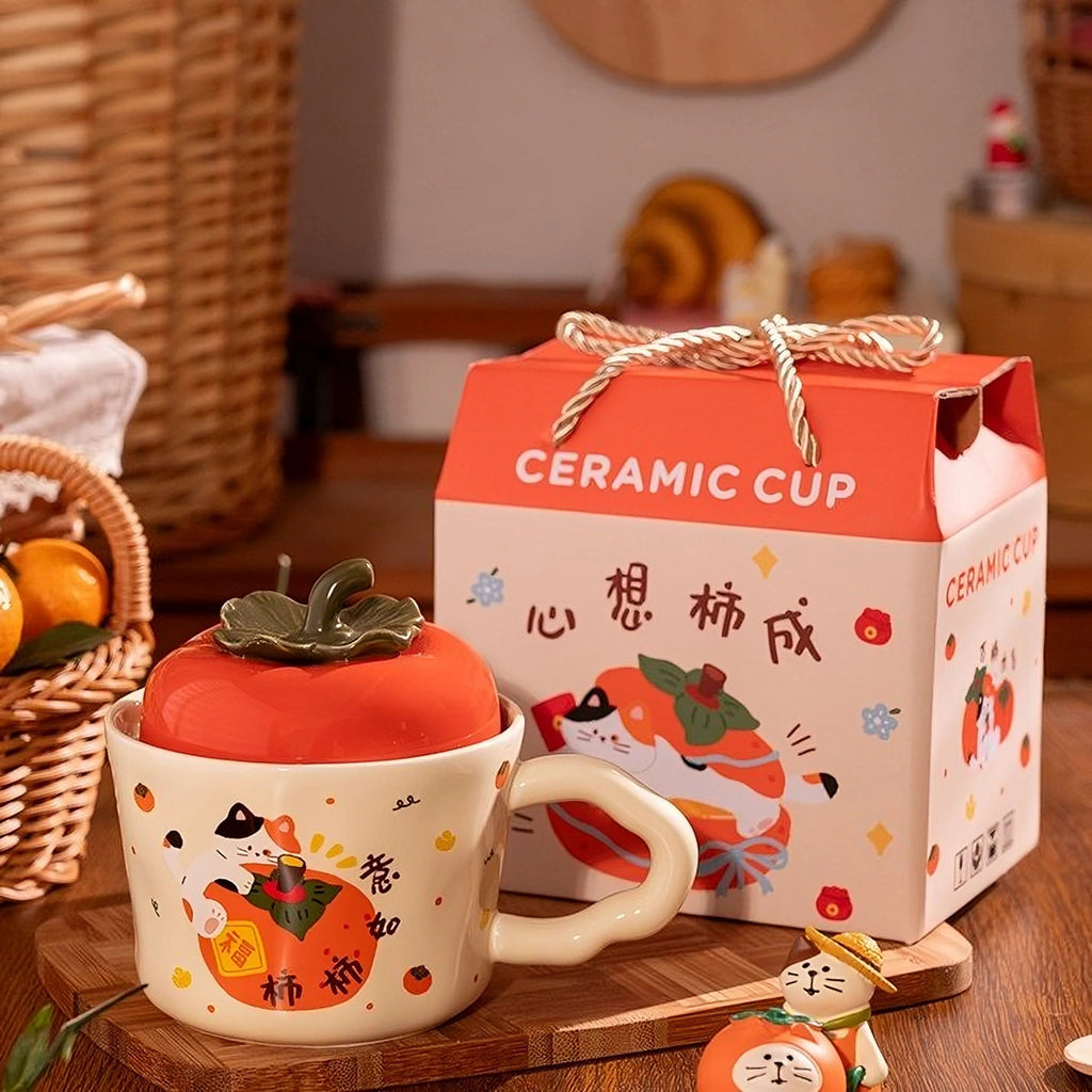 cute persimmon cat ceramic mug with lid on cozy coffee table