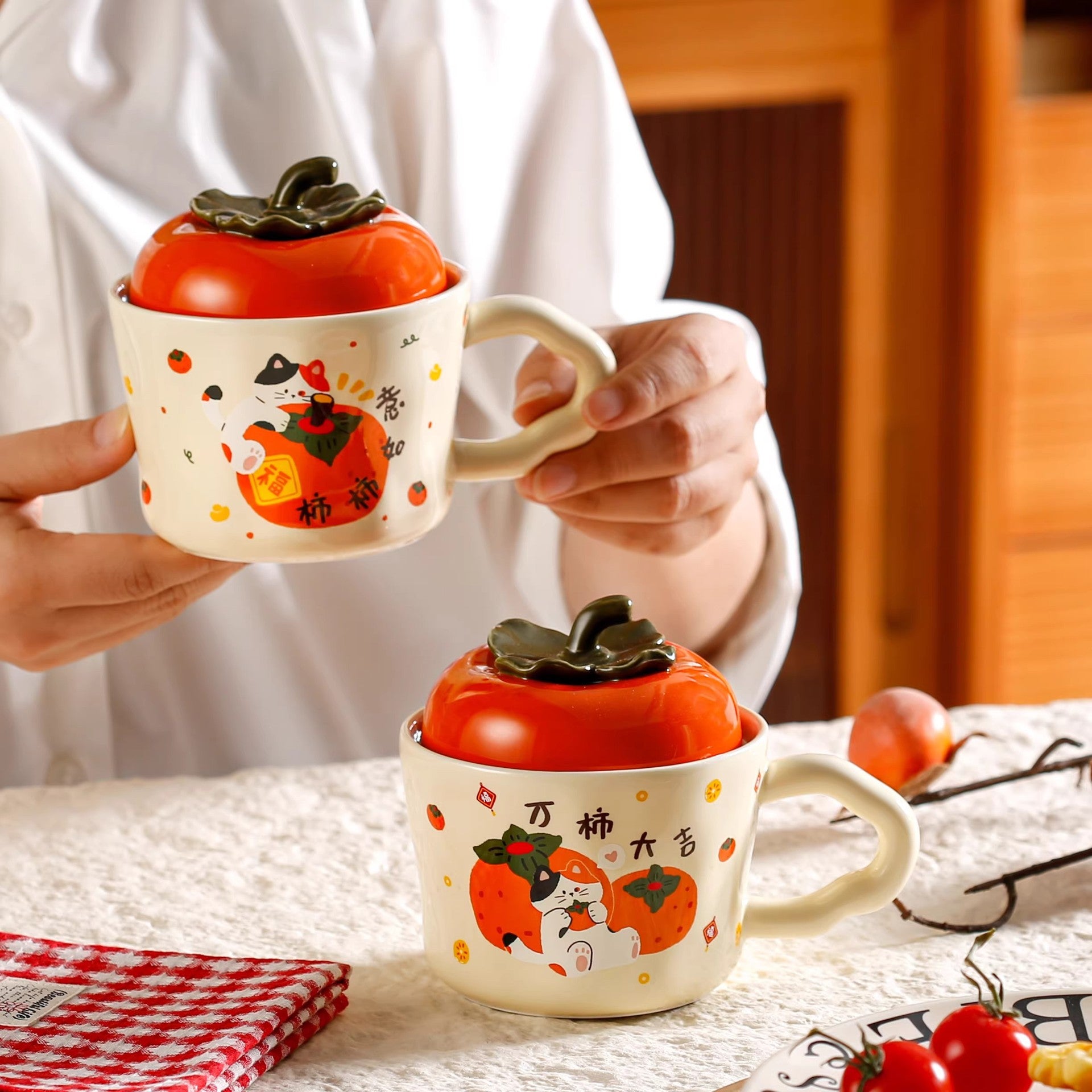 cute persimmon cat ceramic mug with lid on cozy coffee table