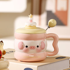 cute animal ceramic mug with lid on cozy desk setup