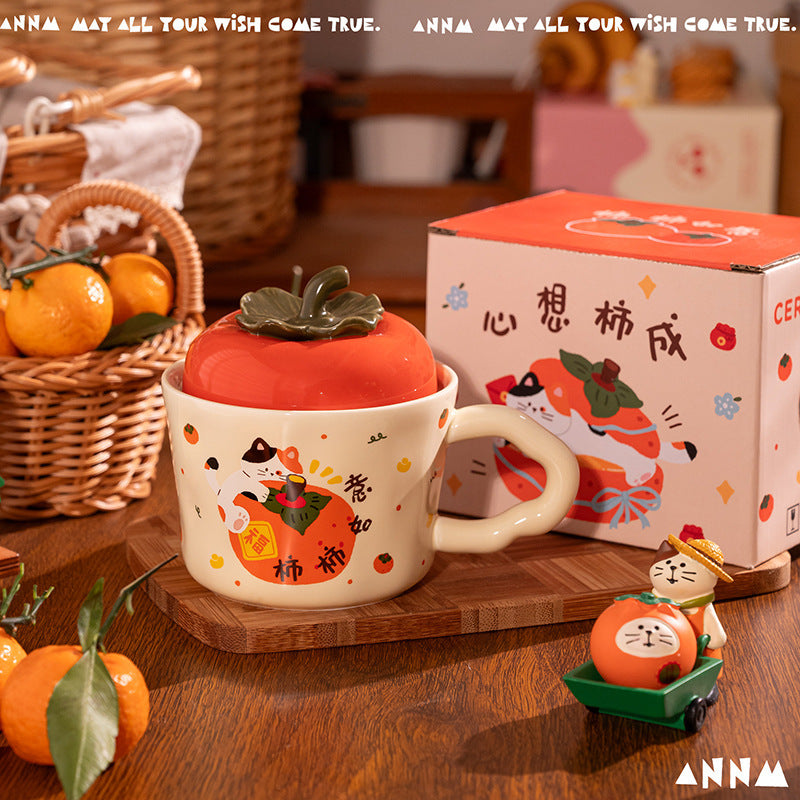 cute persimmon cat ceramic mug with lid on cozy coffee table