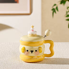 cute animal ceramic mug with lid on cozy desk setup