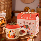 cute persimmon cat ceramic mug with lid on cozy coffee table
